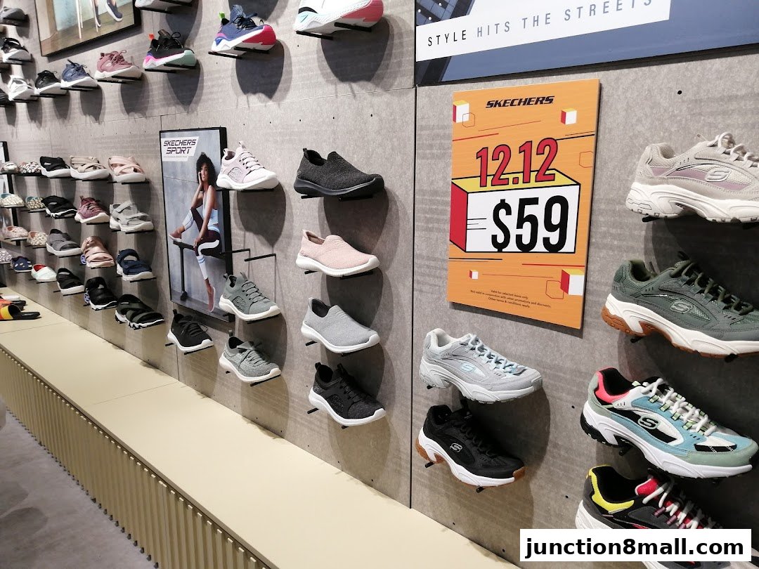 Skechers store interior showcasing a wide variety of athletic shoes displayed on shelves.