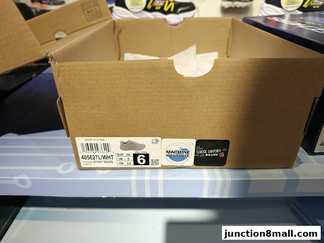 A Skechers shoe box with product information and labels.