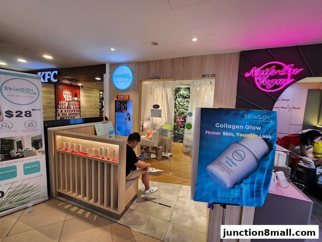 The SkinGO! beauty shop entrance with a display of skincare products and a promotional banner.