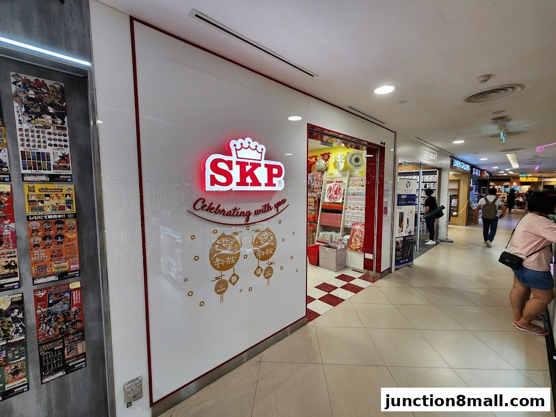 The exterior of the SKP shop with its prominent logo and festive decorations.