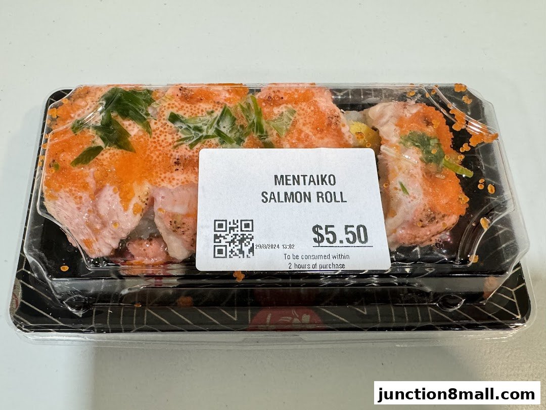 A packaged Mentaiko Salmon Roll sushi with orange roe and green onions.