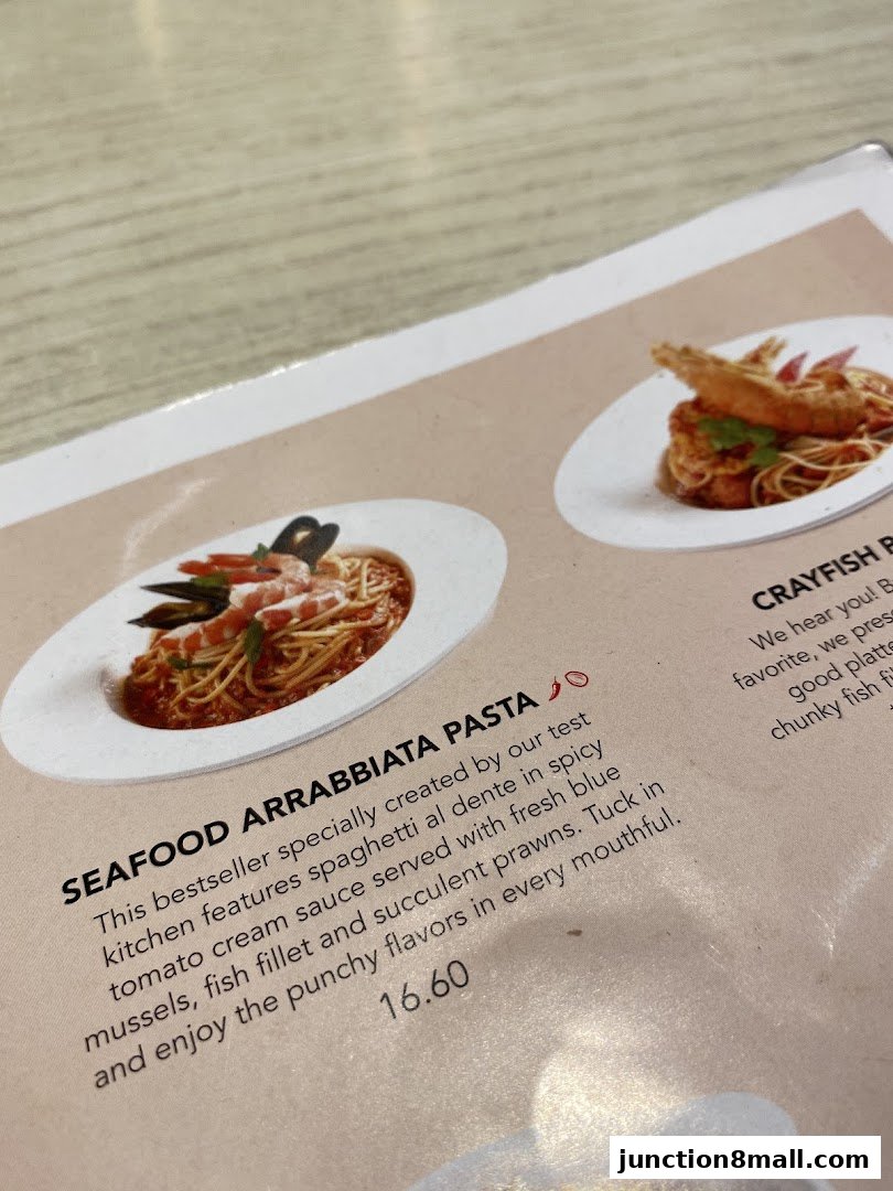 A menu featuring Seafood Arrabbiata Pasta with a price of 16.60.