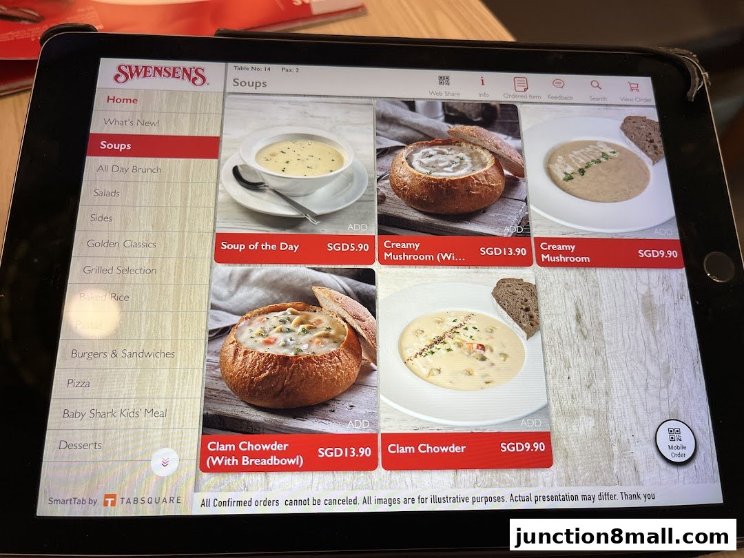 A tablet displaying the Swensen's soup menu with various options and prices.