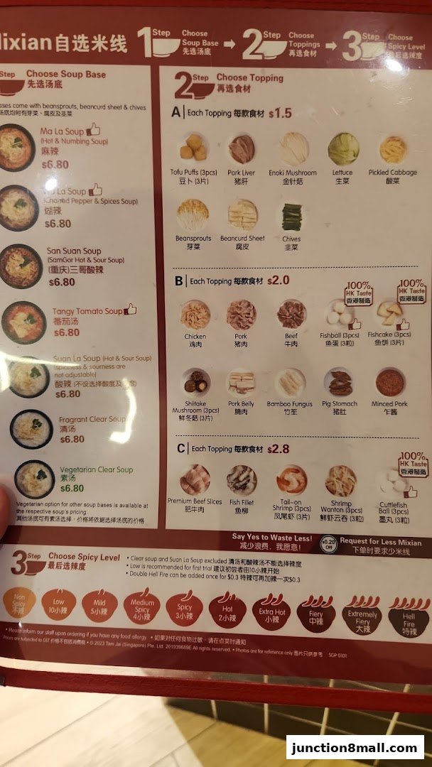 A menu for TamJai SamGor Mixian showing soup bases, toppings, and spicy levels.