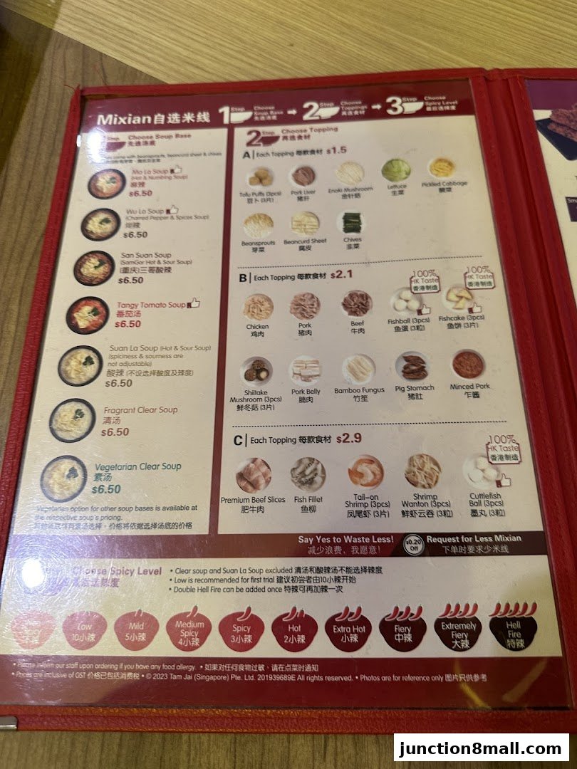 A menu for Tam Jai SamGor Mixian, showcasing soup bases, toppings, and spicy levels.