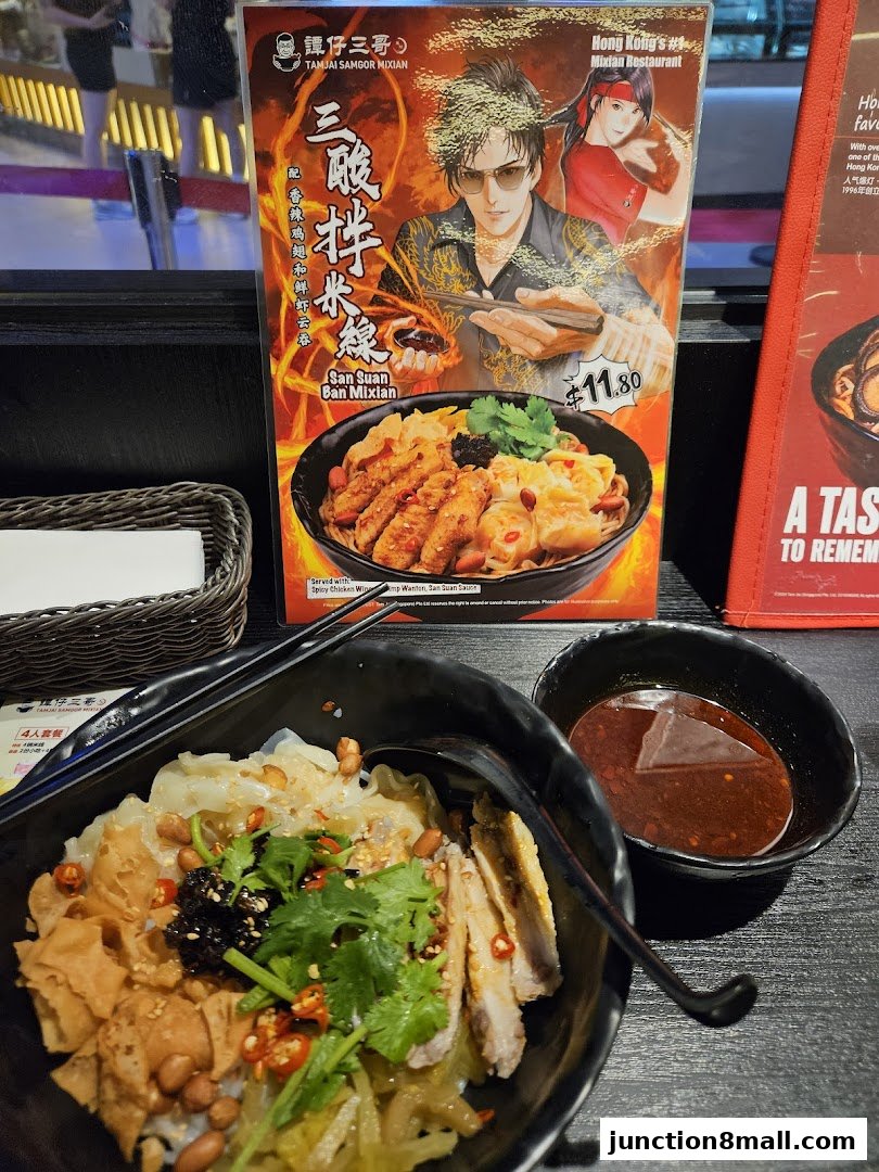 A close-up of a San Suan Ban Mixian dish with a menu featuring anime-style characters.