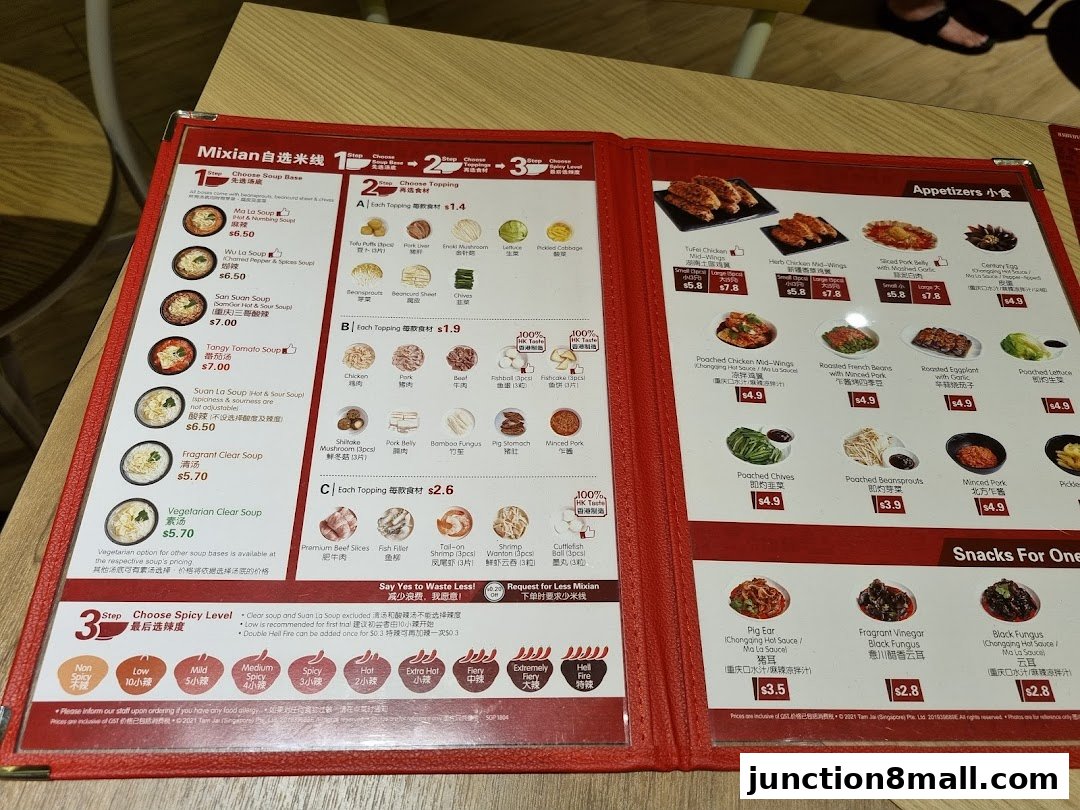 A menu for TamJai SamGor Mixian, showcasing soup bases, toppings, appetizers, and snacks.
