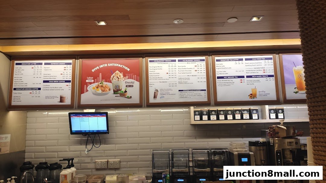 A menu board displaying various coffee and tea drinks at The Coffee Bean and Tea Leaf.