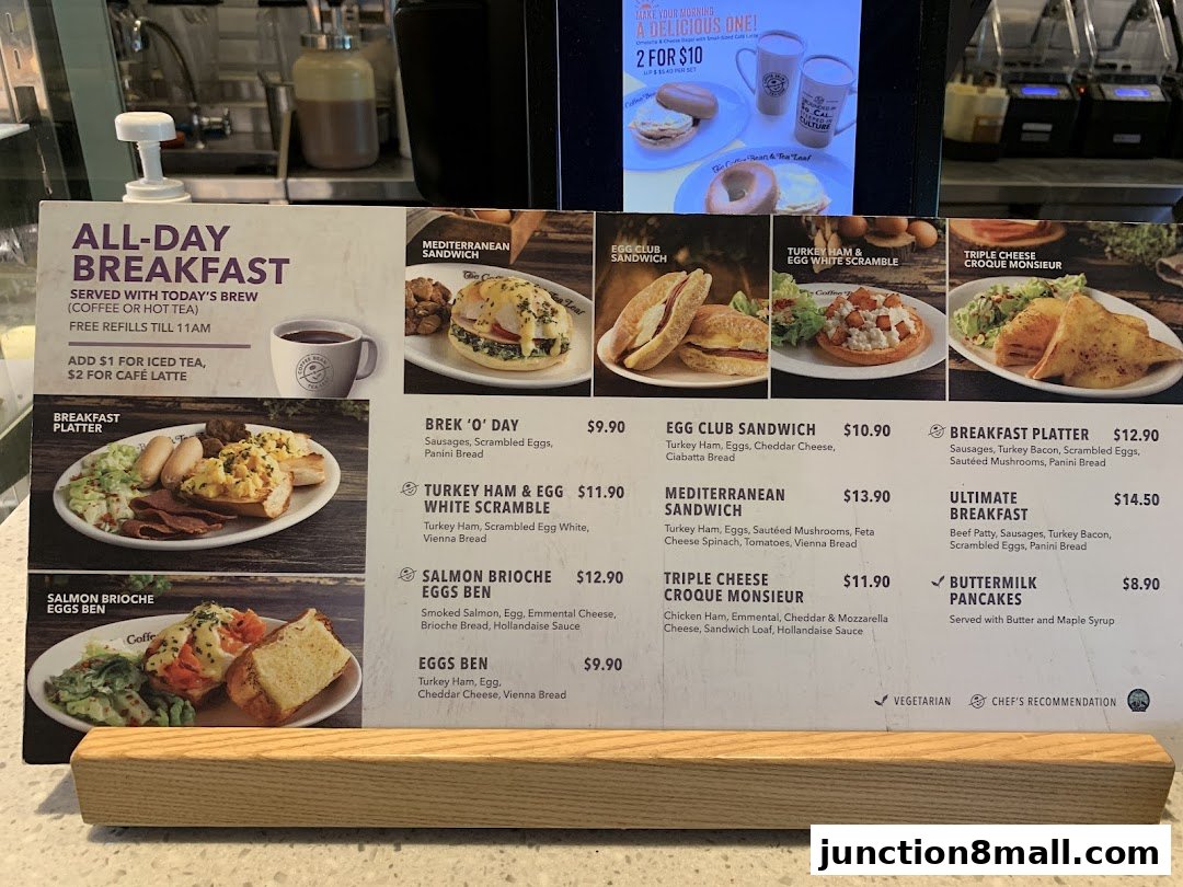 A menu board displaying various breakfast items with images and prices at The Coffee Bean and Tea Leaf.