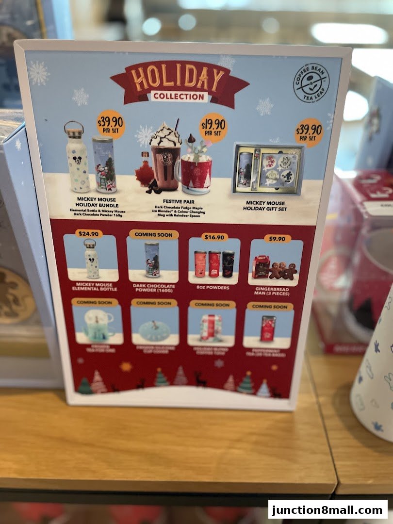 A display board showcasing The Coffee Bean and Tea Leaf's holiday collection with various products and prices.