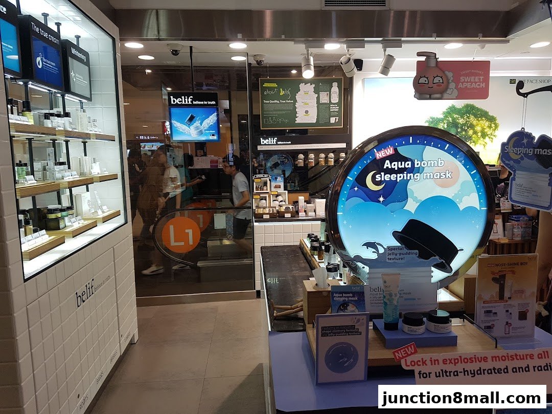 Interior view of a beauty store showcasing skincare products and promotional displays.