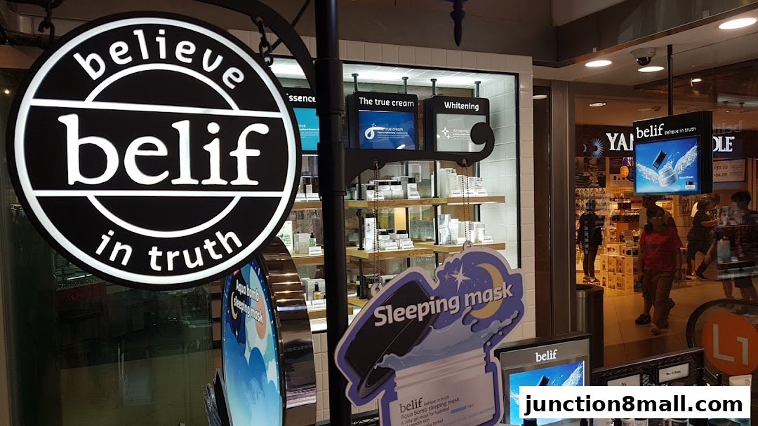 The Belif shop front displays its branding and various skincare products on shelves.