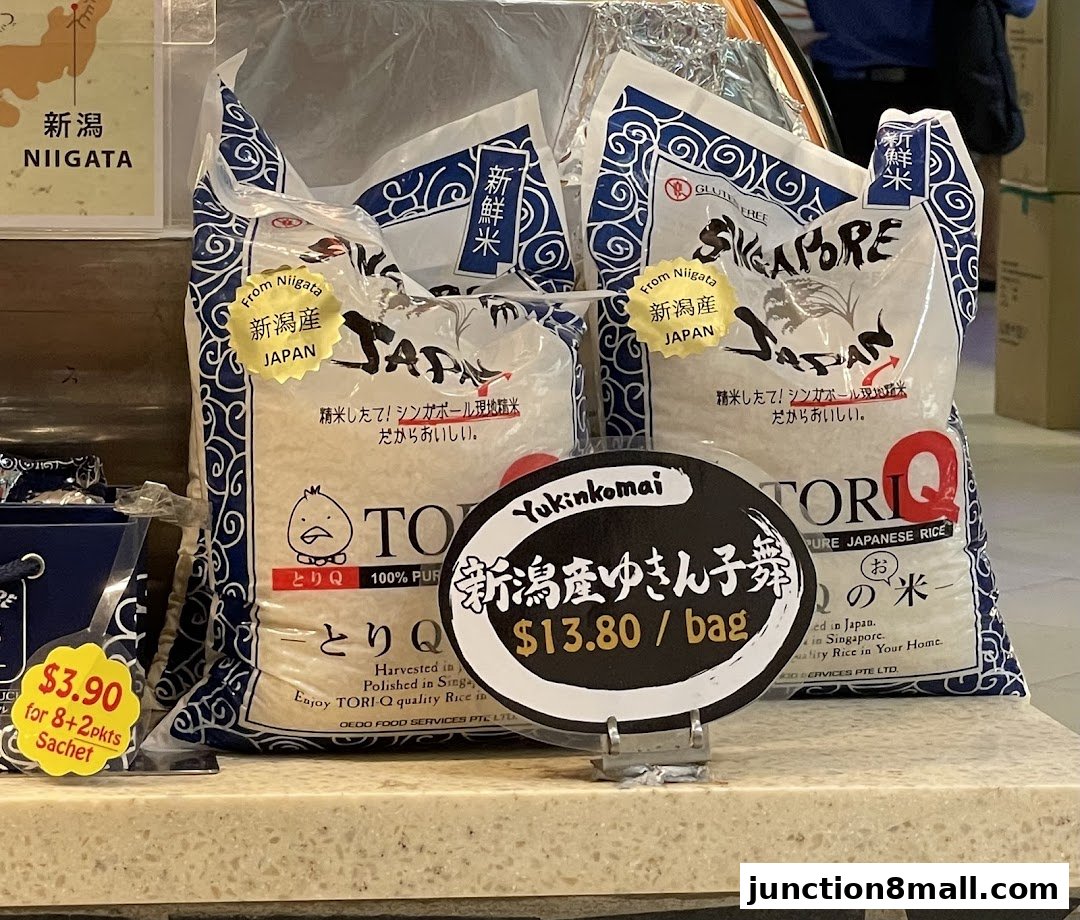 Bags of Tori-Q Japanese rice from Niigata, Japan, with prices displayed.