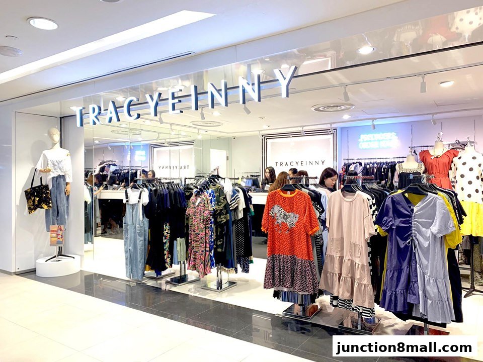 A well-lit fashion boutique showcasing a variety of stylish women's clothing on racks and mannequins.