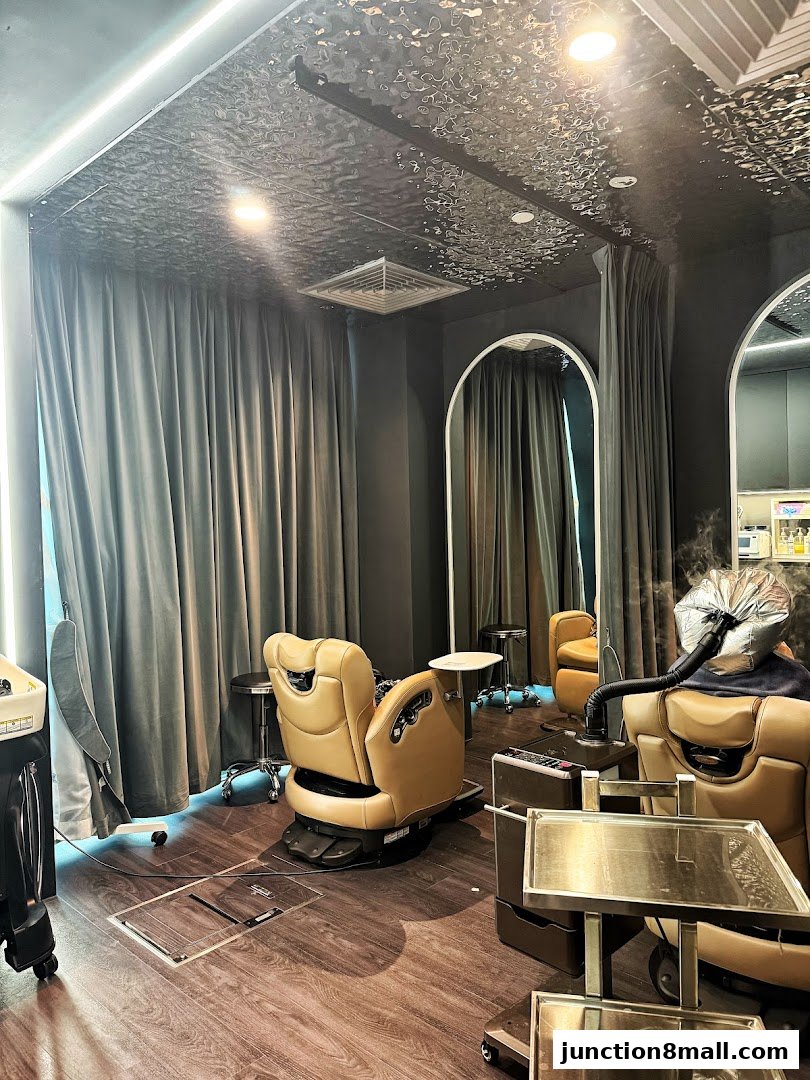 Interior of a modern hair salon with comfortable chairs and stylish decor.