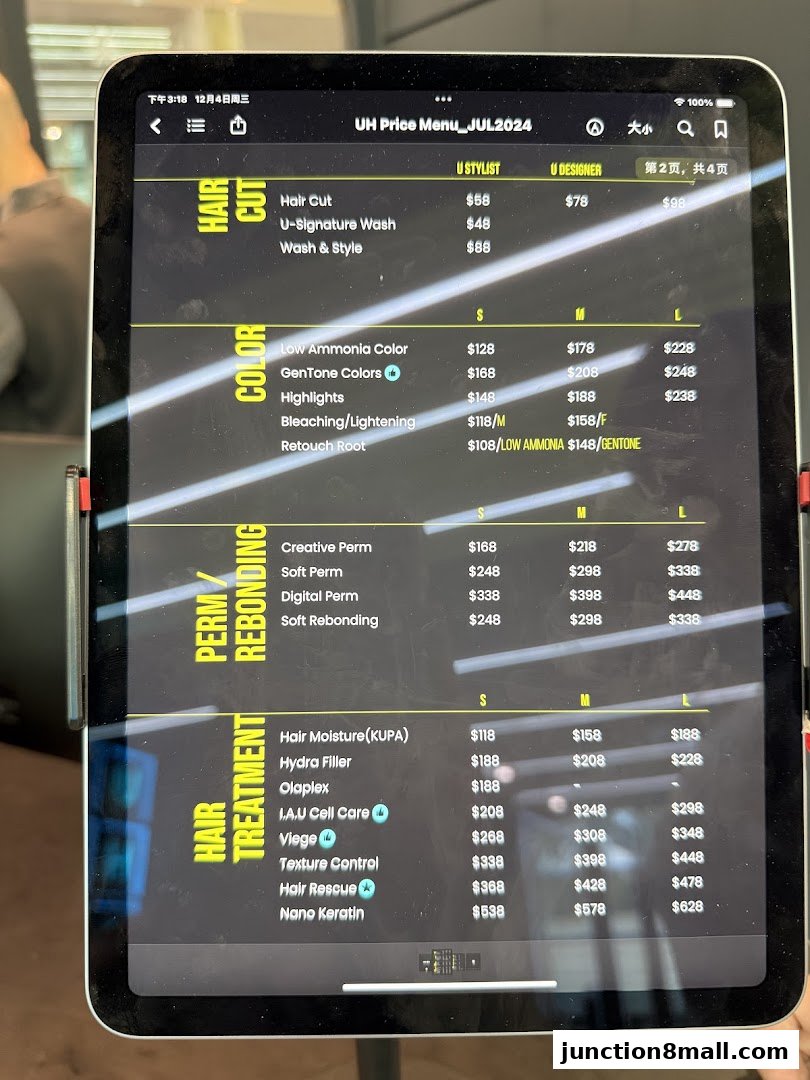 A tablet displaying the price menu for U Hair Bishan, featuring hair services and prices.