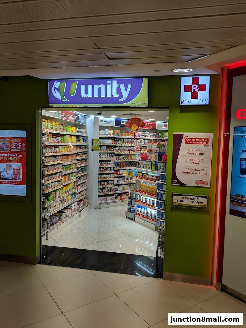 The entrance to a Unity pharmacy shop, stocked with various health and beauty products.