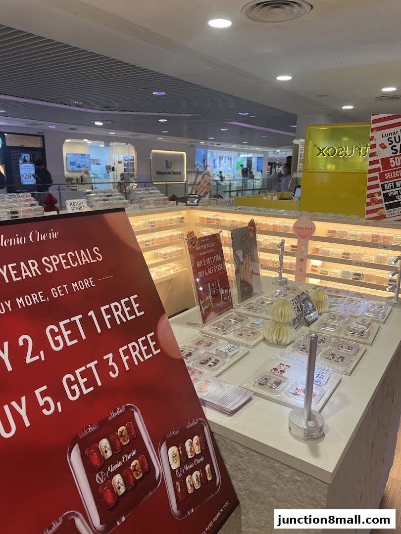 A retail display featuring various nail art products and promotional signage.