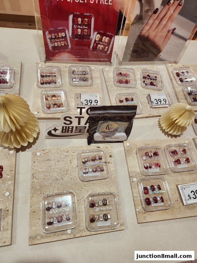 Display of various press-on nail sets with different designs and colors.