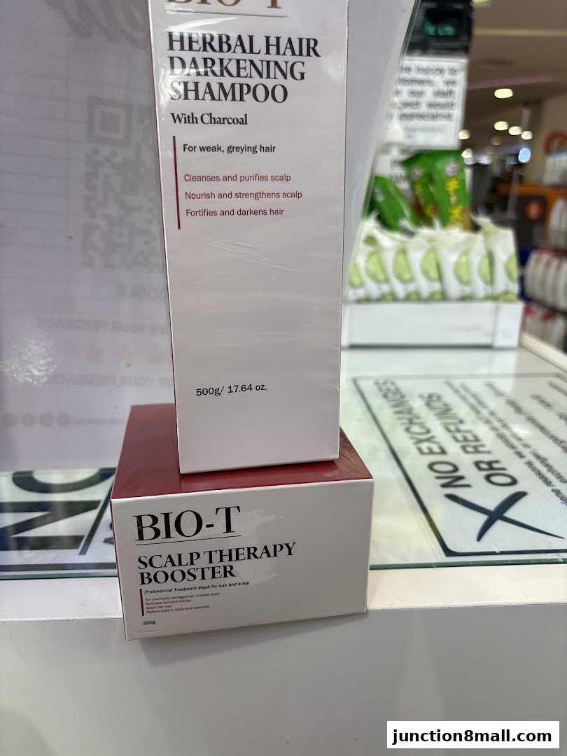Two boxes of hair and scalp treatment products from BIO-T are displayed.