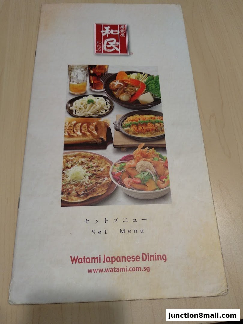 A menu from Watami Japanese Dining showcasing various Japanese dishes and drinks.