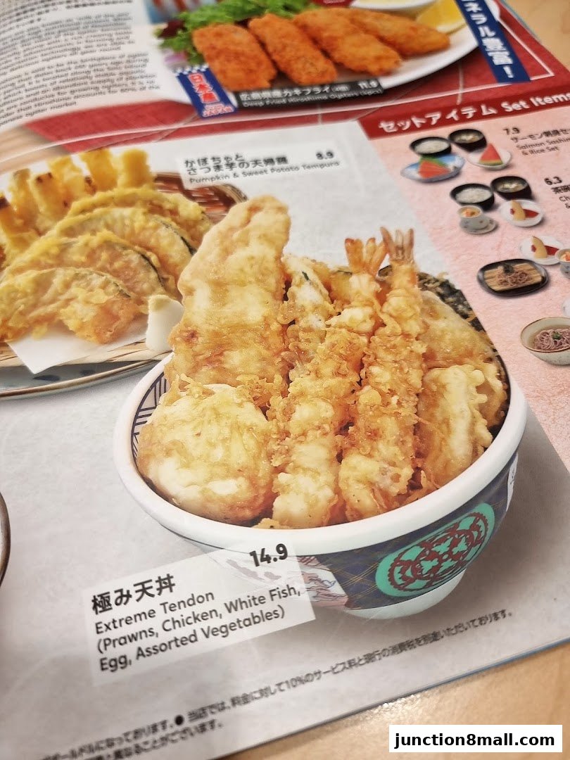 A close-up of a Japanese menu featuring various tempura dishes and set items.