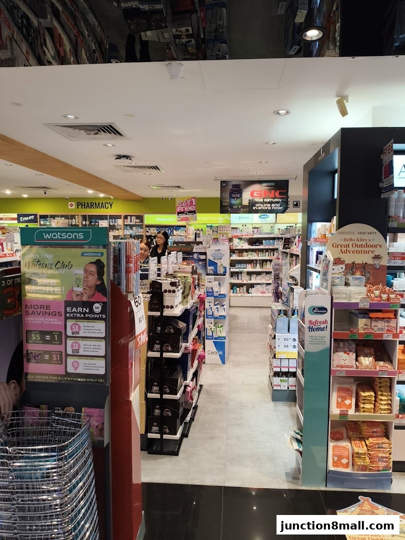 Interior view of a Watsons pharmacy and GNC store, showcasing health and beauty products.