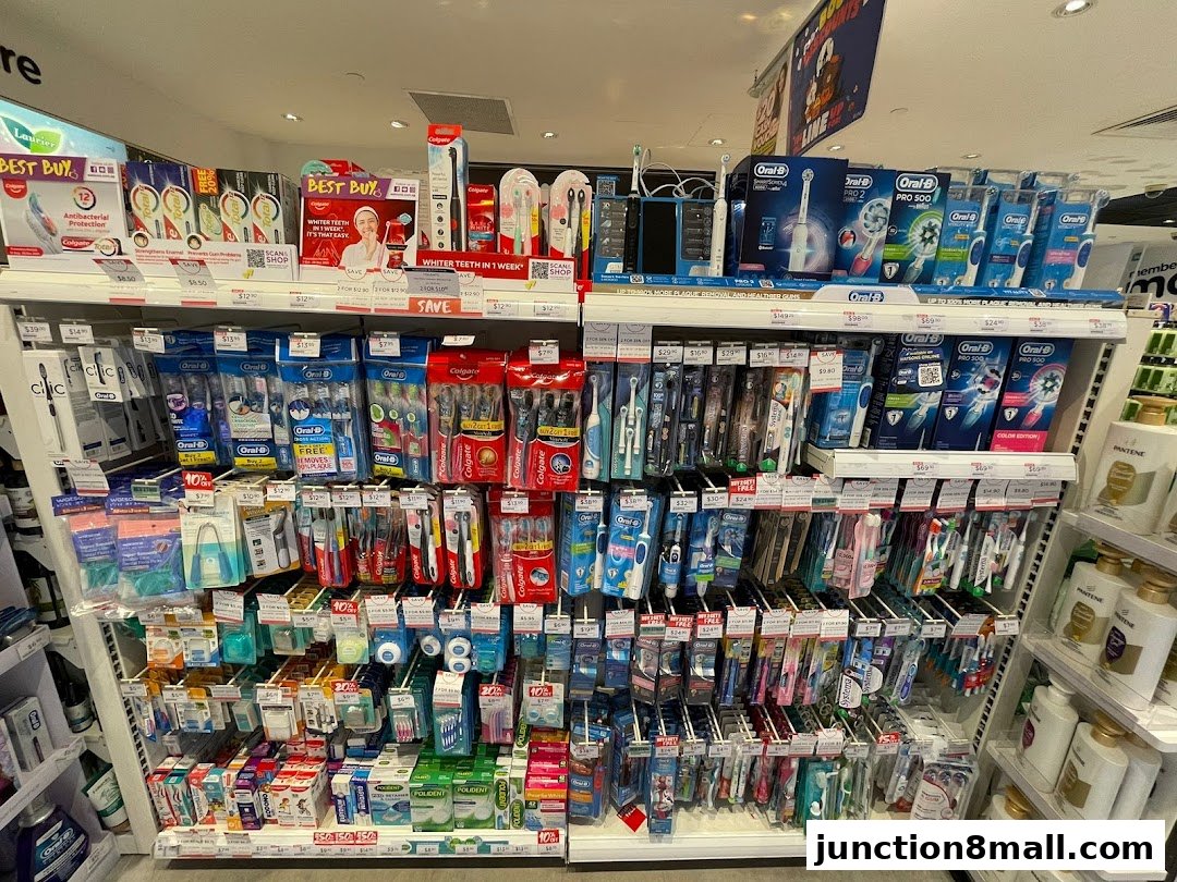 A wide selection of oral hygiene products, including toothbrushes and toothpaste, displayed on shelves.