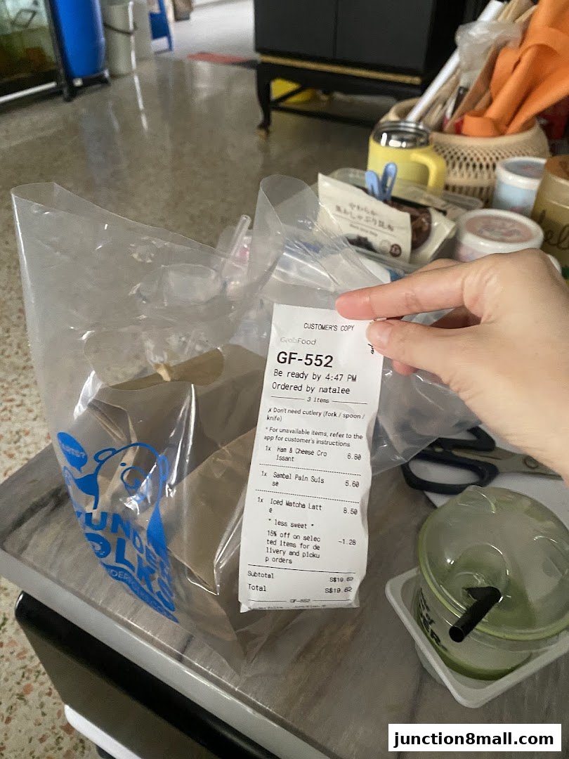 A receipt from Wunderfolks Handmade Tarts with food items and a drink.