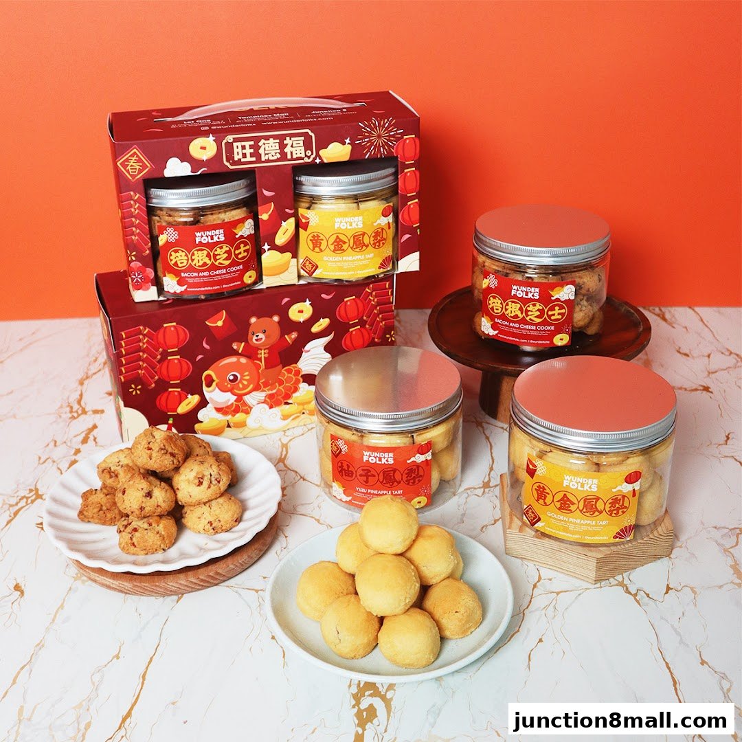 Assortment of handmade tarts and cookies in festive packaging.