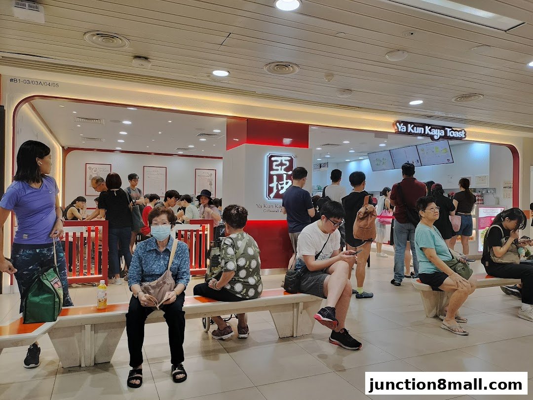 People queuing at Ya Kun Kaya Toast, a popular Singaporean eatery.