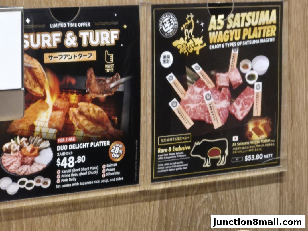 Promotional posters for Yakiniku Like Junction 8, showcasing Surf & Turf and Wagyu platters.
