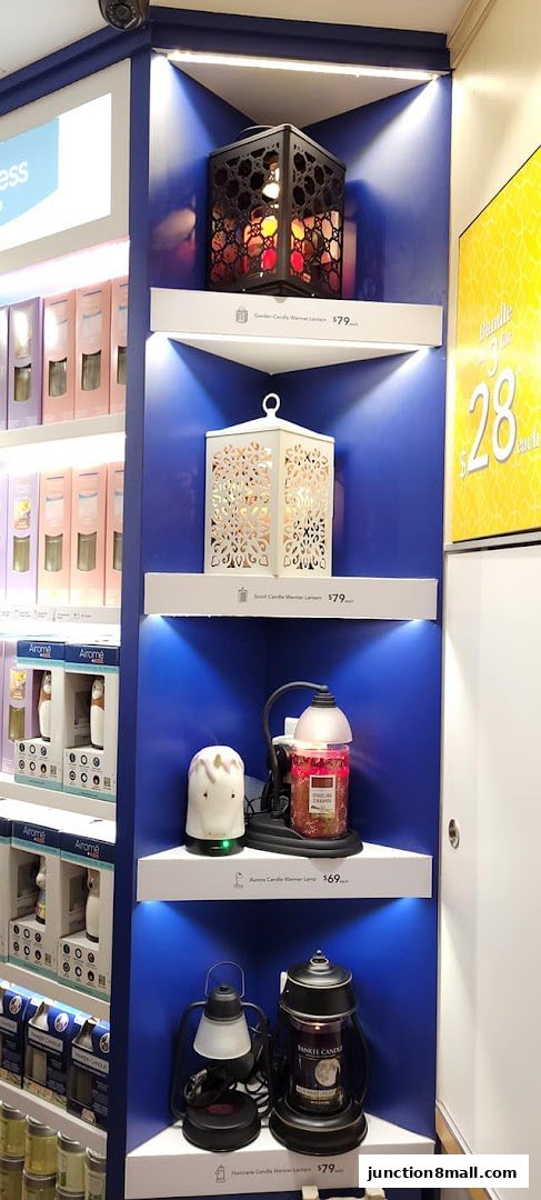 A display of various candle warmers and lanterns from Yankee Candle.