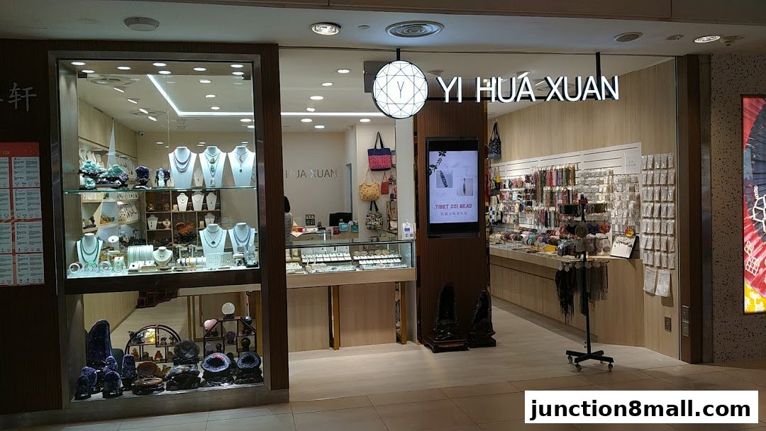 Yi Hua Xuan shop displays jewelry, beads, and decorative stones in a well-lit, modern retail space.