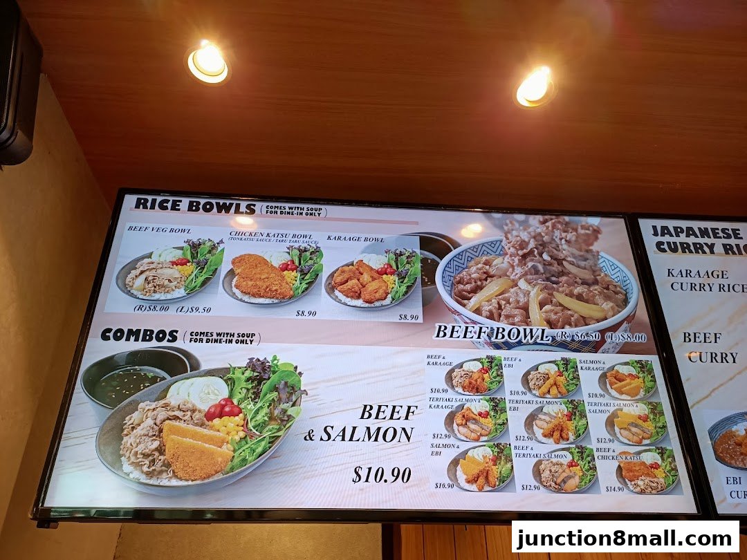 A digital menu board displaying various Japanese rice bowls and combos with appetizing food images.